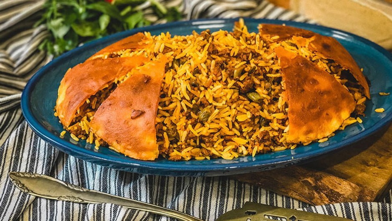 طرز تهیه لوبیا پلو مجلسی با گوشت چرخکرده؛ راز خوشمزگی و شفته نشدن